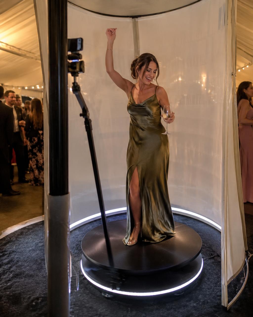 Illustrative guest celebrating on a 360 video booth